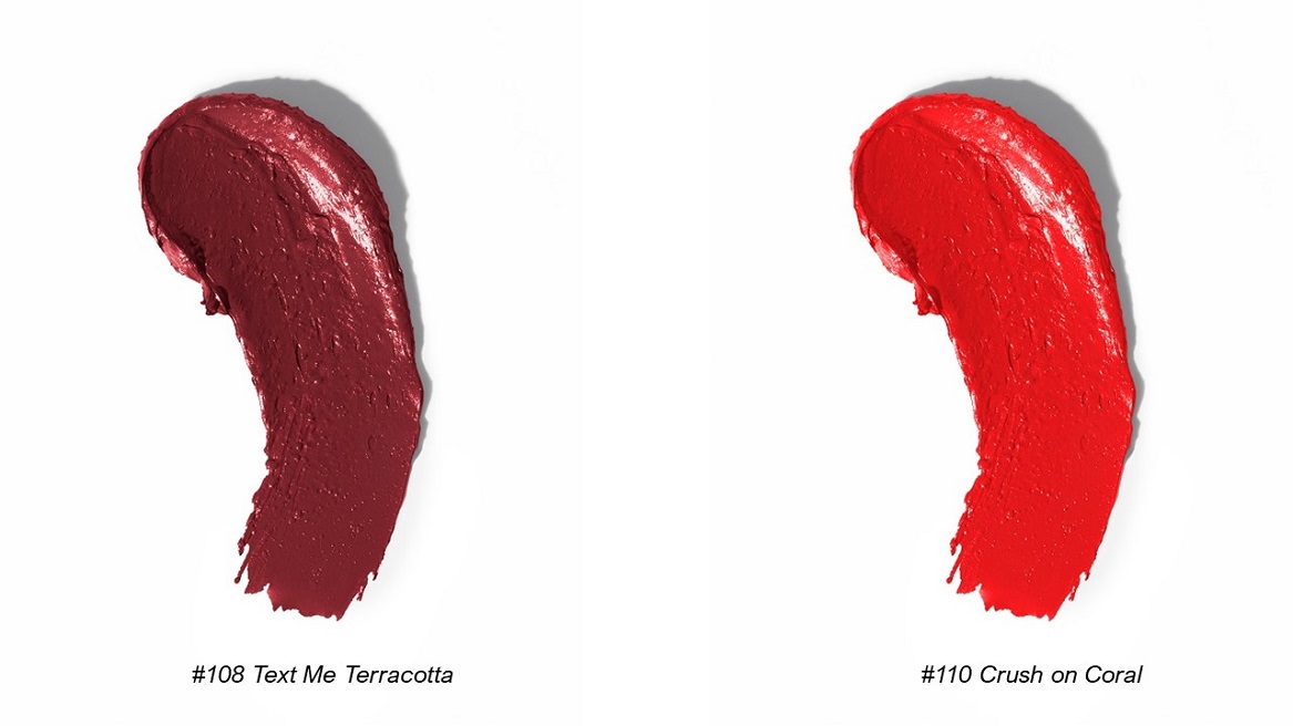 A sample of dark red & bright red lipstick smeared against a white background.